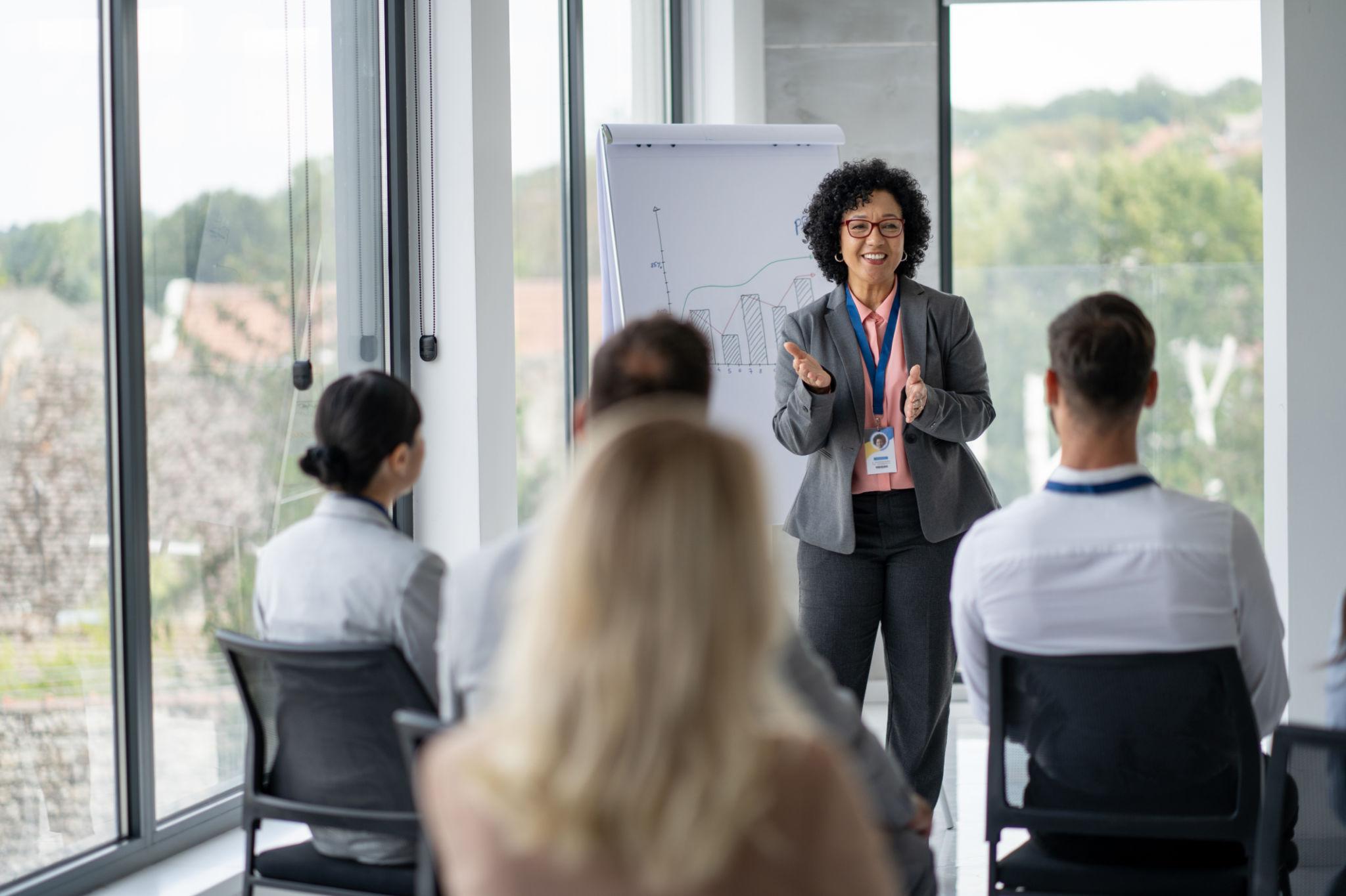 Corporate workshop led in a bright executive meeting room